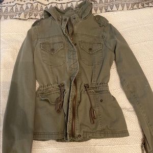 army green zip up jacket.